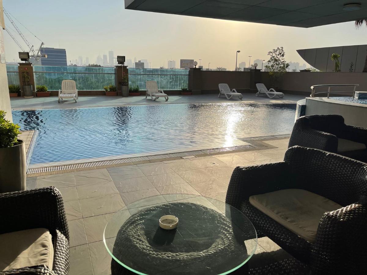 Tulip Creek Hotel Apartments Dubai Esterno foto